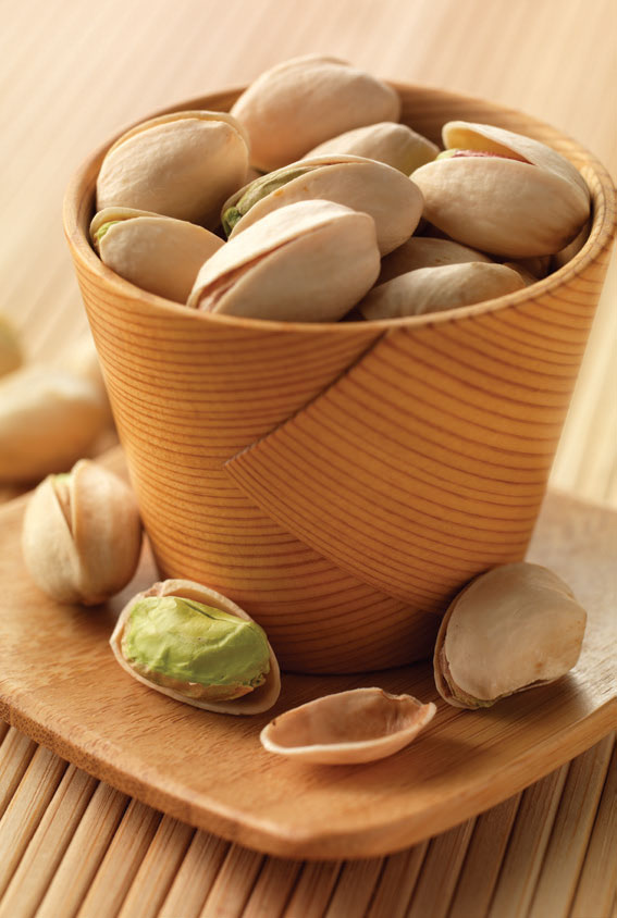 Pistachios in a wood bowl
