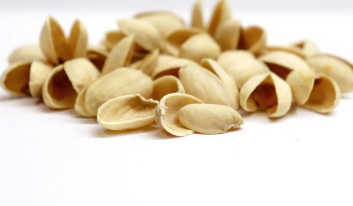 Empty shells of American pistachios